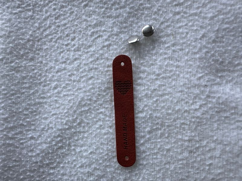 Lapp  kunstskinn «Handmade» med metallfeste Brun